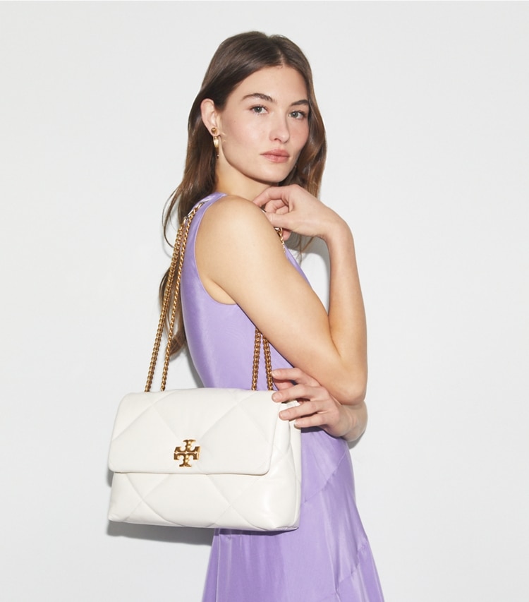 Tory Burch designer shoulder bags Kira Diamond Quilt Convertible Shoulder Bag in Blanc accessory on model