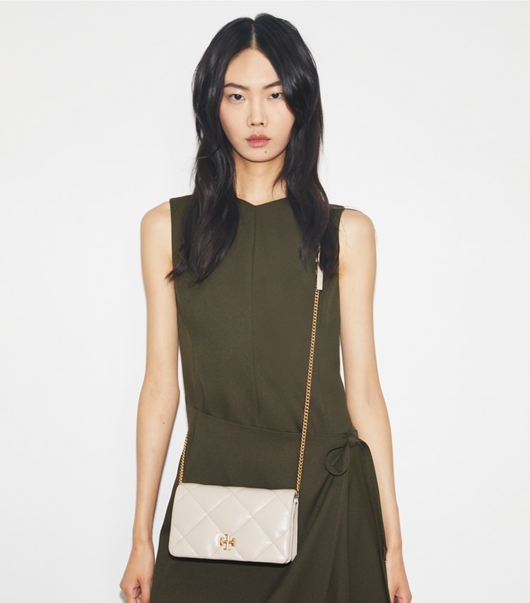 Tory Burch designer mini bags Kira Diamond Quilt Crossbody in Tortora accessory on model