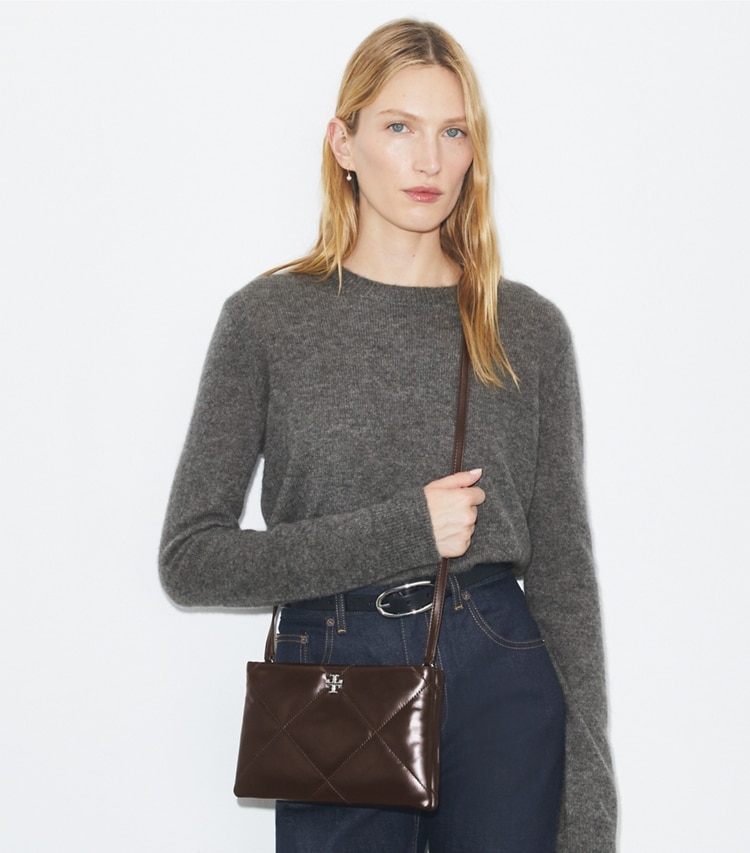 Tory Burch designer crossbody bags Kira Diamond Quilt Crossbody Bag in Cocoa accessory on model