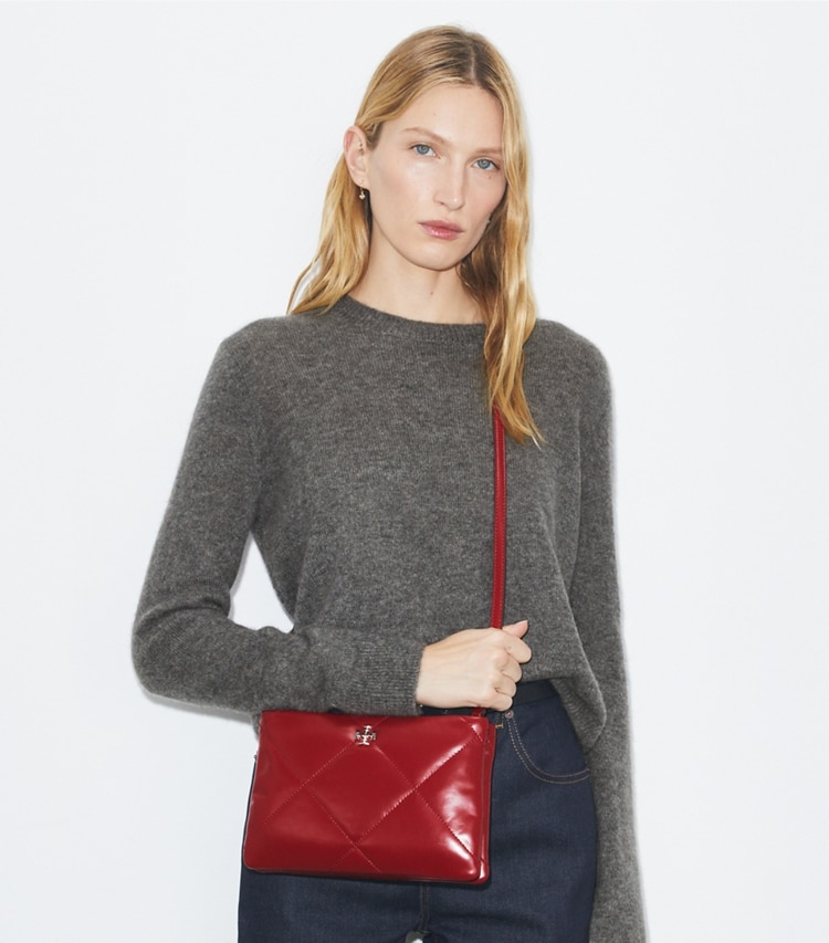 Tory Burch designer crossbody bags Kira Diamond Quilt Crossbody Bag in Red accessory on model