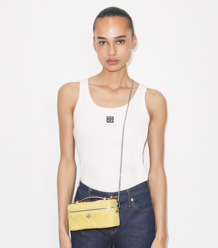 Tory Burch designer mini bags Kira Diamond Quilt Denim Vanity Case in Yellow accessory on model
