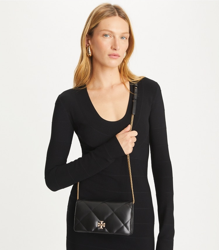 Tory Burch designer mini bags Kira Diamond Quilt Pavé Logo Crossbody in Black accessory on model