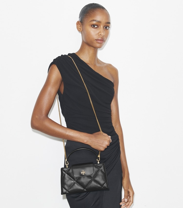 Tory Burch designer mini bags Kira Diamond Quilt Top-Handle Bag in Black accessory on model