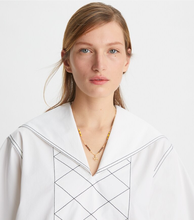 Tory Burch designer necklaces Kira Enamel Bar Pendant Necklace in Tory Gold / Multi accessory on model