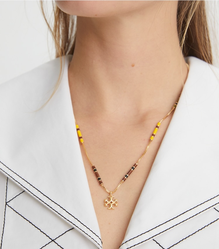 Tory Burch designer necklaces Kira Enamel Bar Pendant Necklace in Tory Gold / Black / New Ivory additional on model