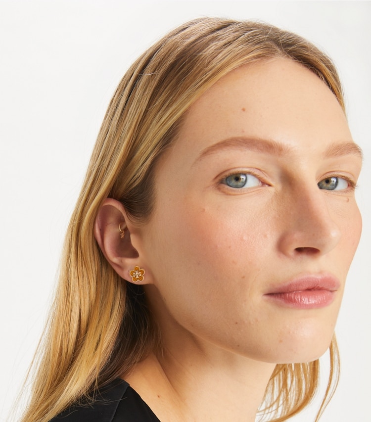 Tory Burch designer earrings Kira Enamel Flower Stud Earring in Tory Gold / Brown accessory on model