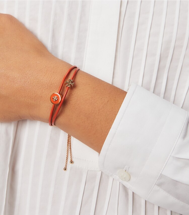 Tory Burch designer bracelets Kira Enameled Slider Bracelet in Tory Gold/Mango accessory on model
