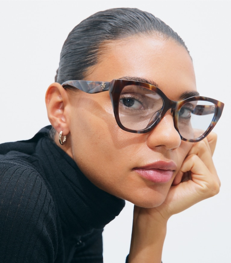 Tory Burch designer sunglasses & eyewear Kira Geometric Cat-Eye Eyeglasses in BLUE/GREEN/BROWN TORTOISE accessory on model
