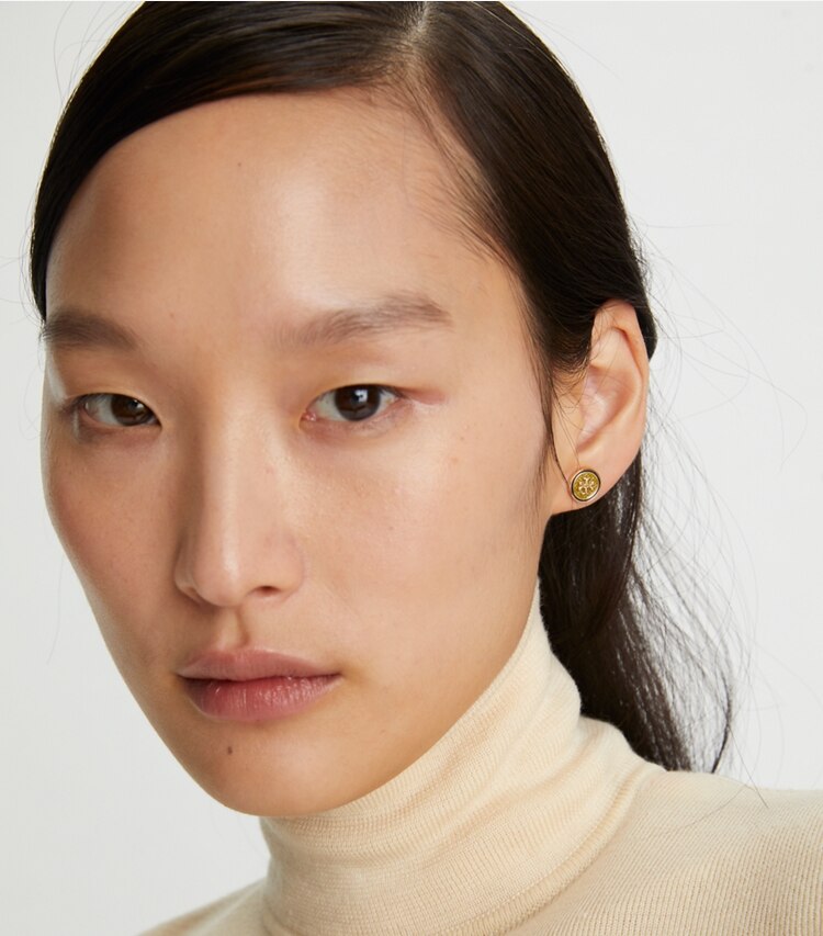 Tory Burch designer earrings Kira Guilloché Circle-Stud Earring  in Tory Gold / Yellow / New Ivory accessory on model