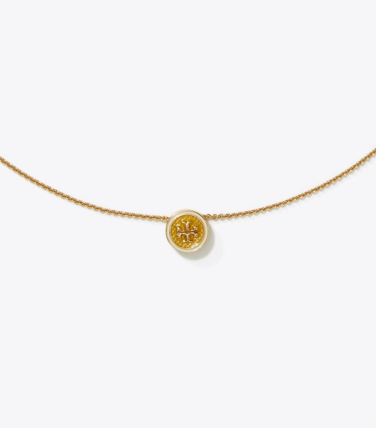 Tory Burch designer collane Kira Guilloché Pendant Necklace  in Tory Gold / Yellow / New Ivory dettaglio