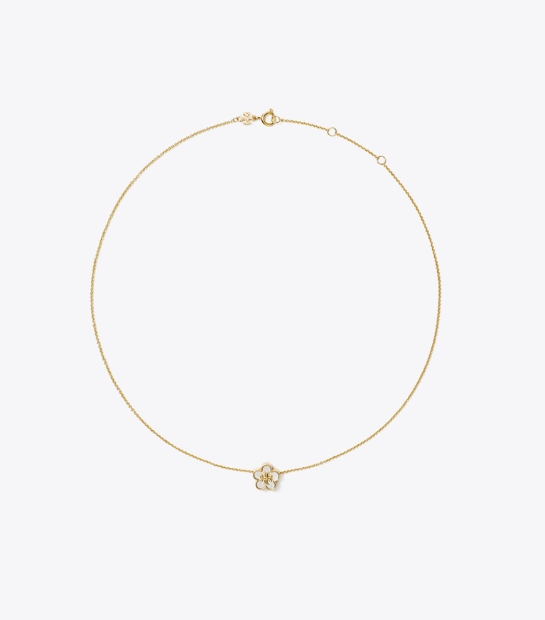 Tory Burch designer halsketten Kira Halskette mit Blumenanhänger in Tory Gold / Mother of Pearl front
