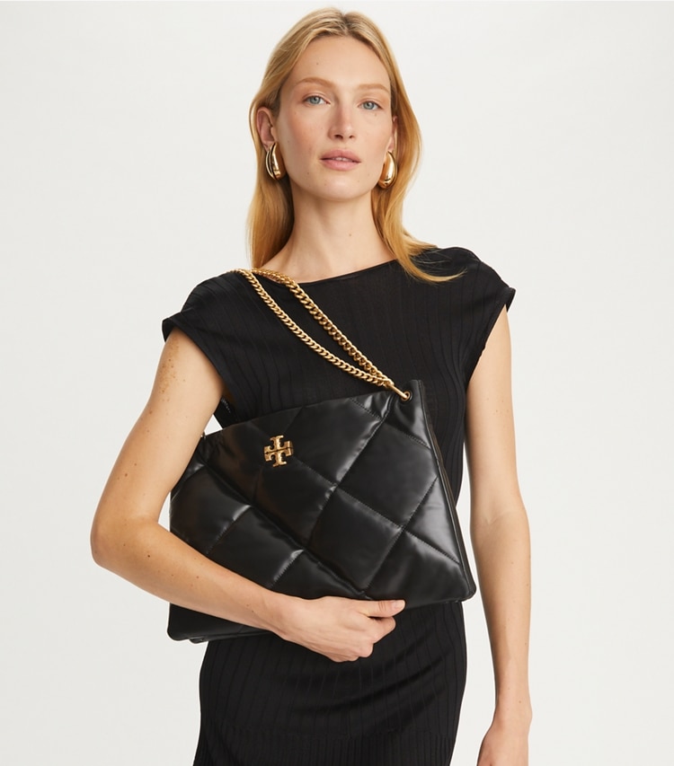 Tory Burch designer schultertaschen Kira Henkeltasche mit Rautensteppung in Black accessory on model