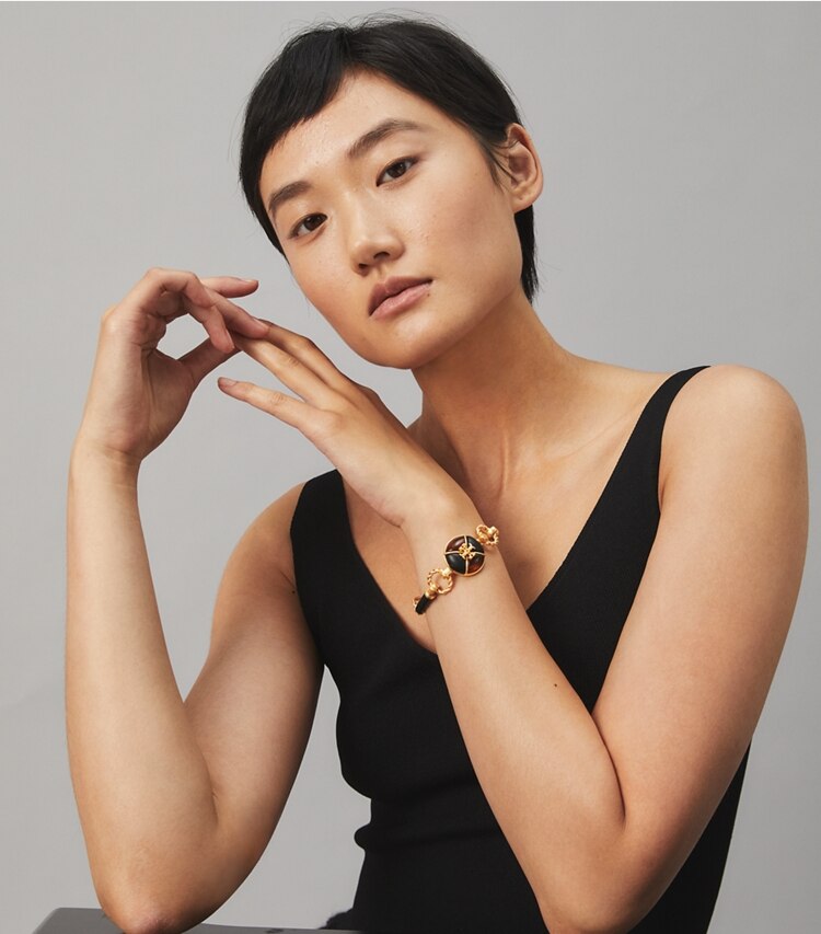 Tory Burch designer bracelets Kira Leather Bracelet in Rolled Brass / Tortoise / Black accessory on model