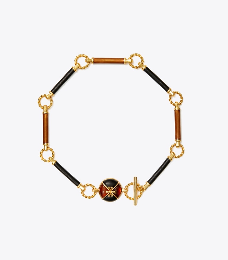 Tory Burch designer necklaces Kira Leather Long Necklace in Rolled Brass / Black / Moose front