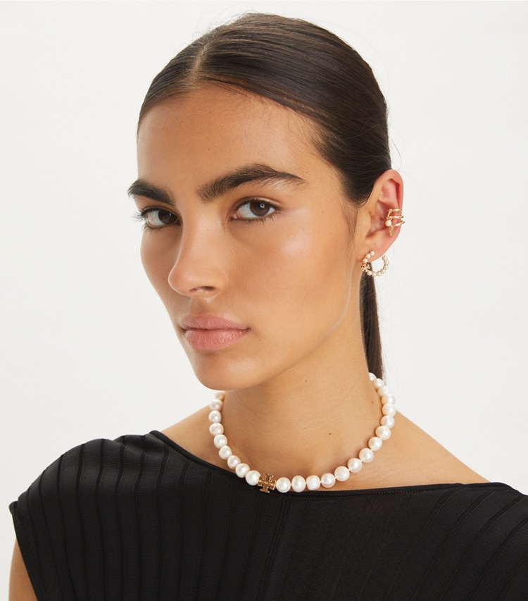 Tory Burch designer earrings Kira Multi Hoop Earring in Tory Gold / Cream accessory on model