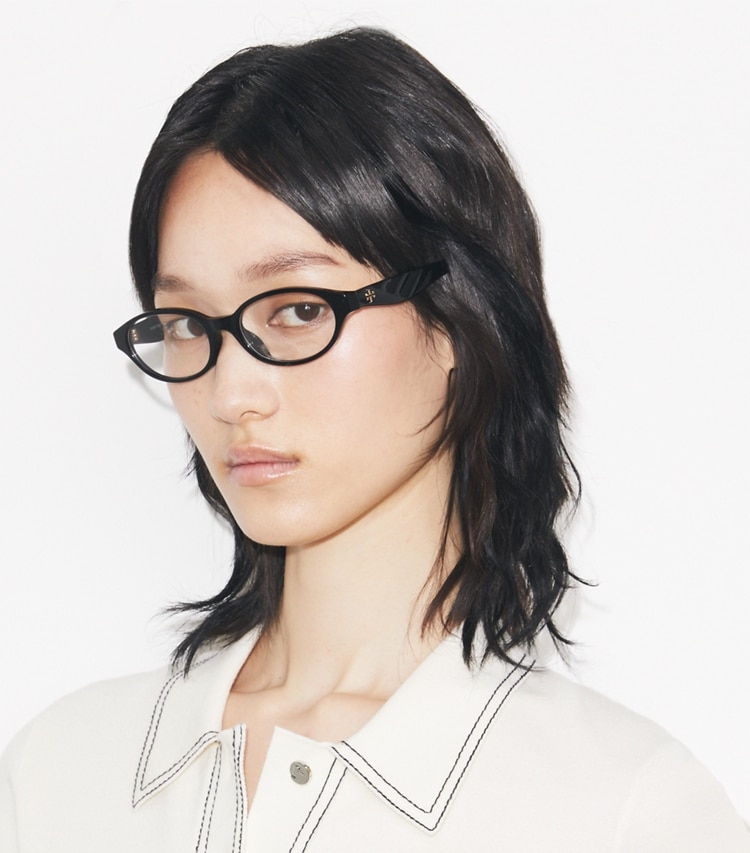 Tory Burch designer sunglasses & eyewear Kira Oval Eyeglasses in DARK TORTOISE accessory on model