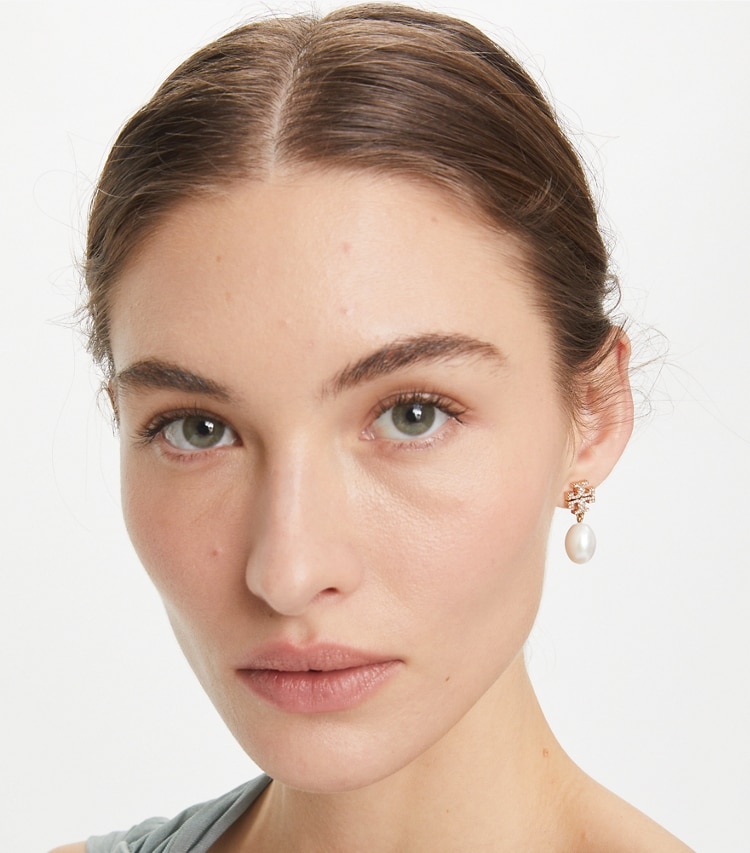 Tory Burch designer earrings Kira Pavé Pearl Drop Earring in Tory Gold / Pearl accessory on model