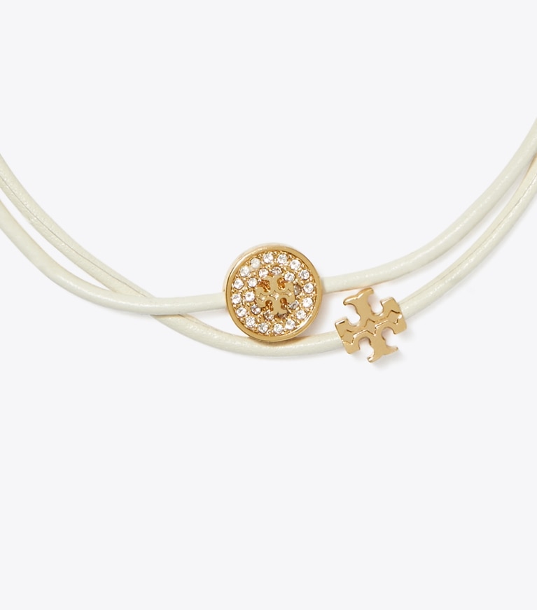 Tory Burch designer bracelets Kira Pavé Slider Bracelet in Tory Gold / New Ivory / Crystal front