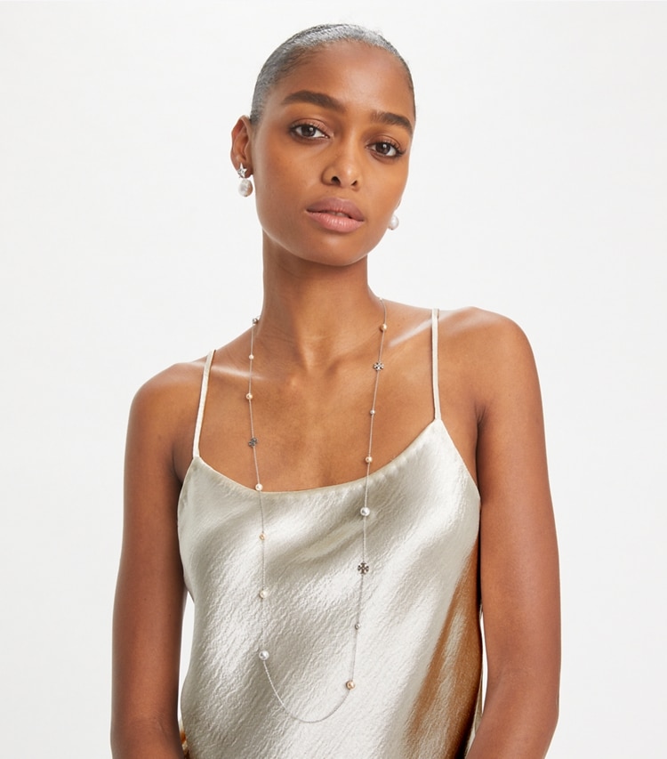 Tory Burch designer necklaces Kira Pearl Delicate Long Necklace in Tory Silver / Pearl accessory on model