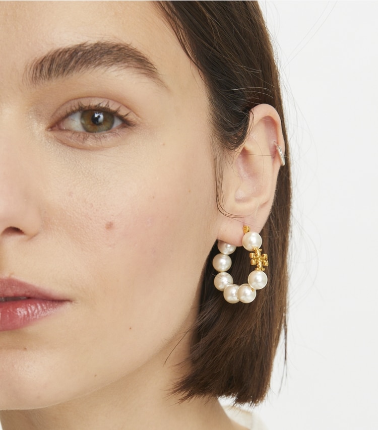 Tory Burch designer earrings Kira Pearl Hoop Earrings in Rolled Brass #59 / Ivory accessory on model