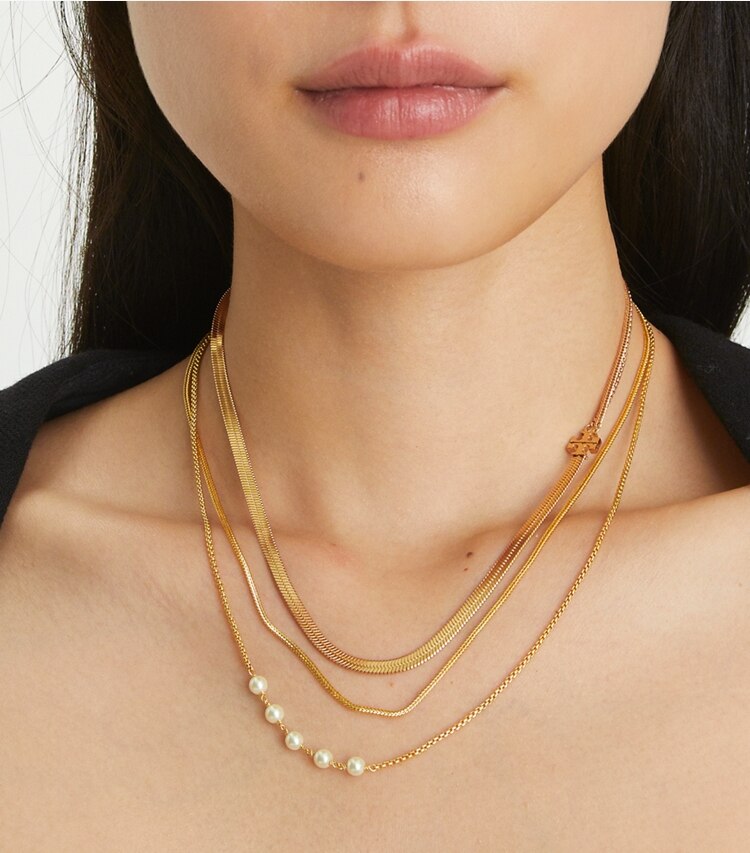 Tory Burch designer necklaces Kira Pearl Layered Necklace in Tory Gold / Tory Gold accessory on model
