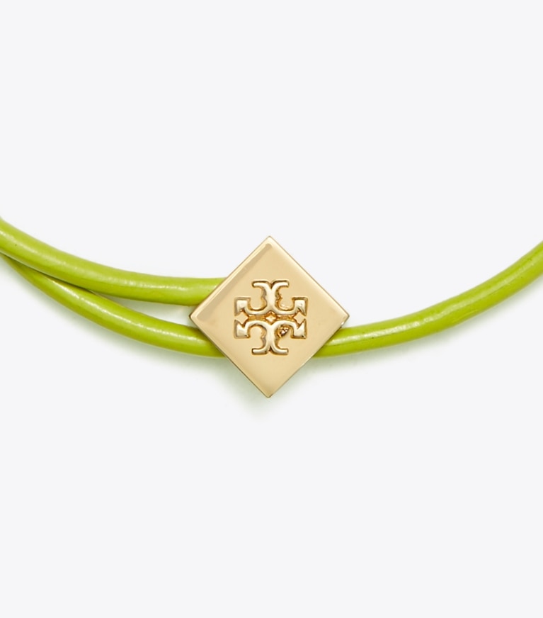 Tory Burch designer armbänder Kira Slider Bracelet in Tory Gold / Canary Yellow front
