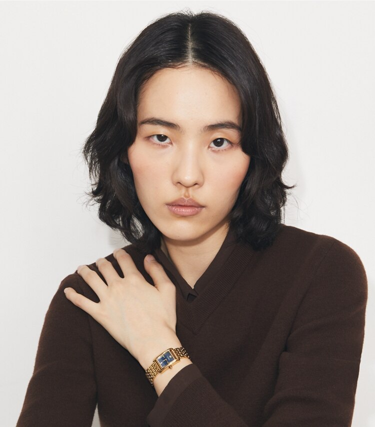 Tory Burch designer armbanduhren Kleine Eleanor Armbanduhr in NAVY/GOLD accessory on model