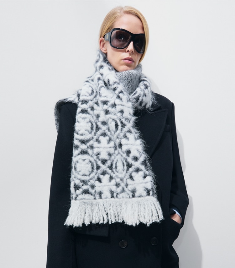 Tory Burch designer scarves Knit Brushed T Monogram Oblong Scarf in T Monogram Diamond Oblong Camel accessory on model