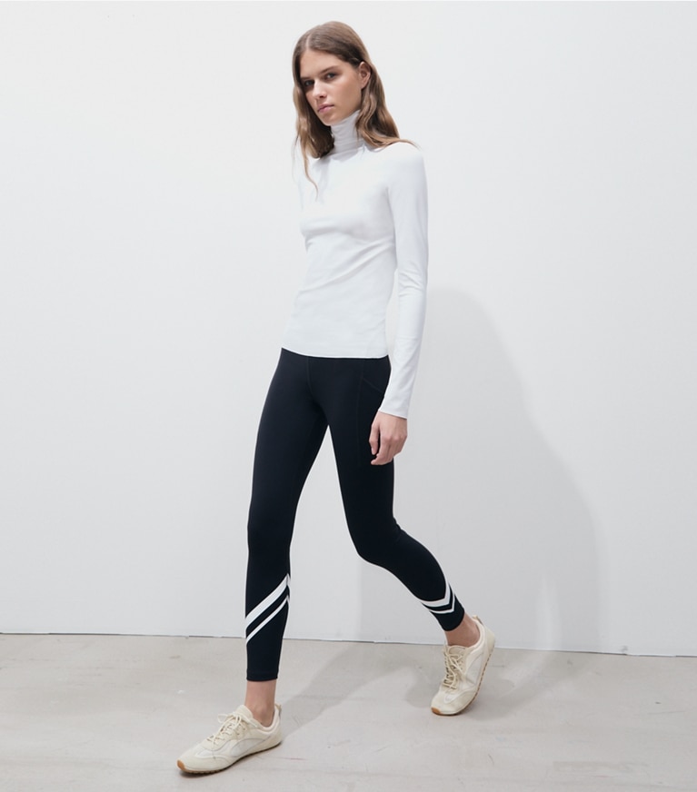 Tory Burch designer tops Knit Turtleneck in Marshmallow on model front
