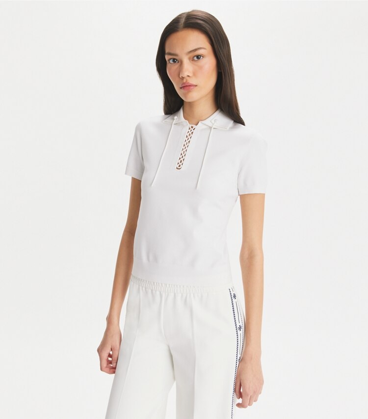 Tory Burch designer トップス レースアップ ポロセーター in White on model detail
