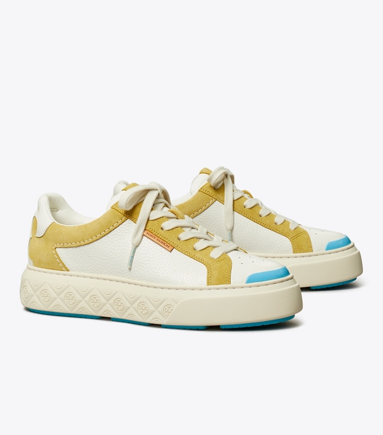 Tory Burch designer sneakers Ladybug Sneaker in PURITY / CORNBREAD angle