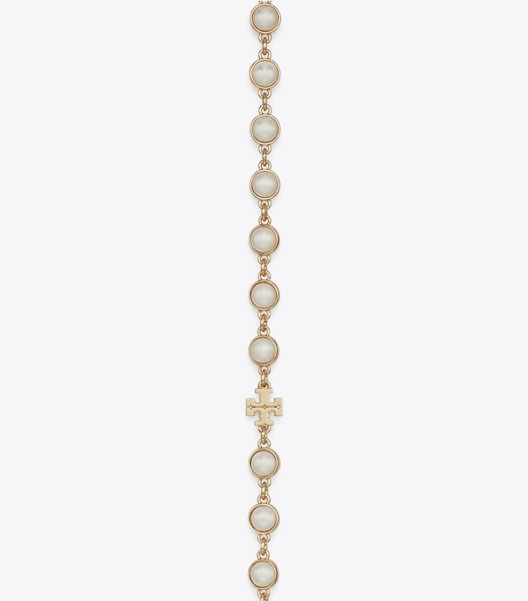 Tory Burch designer halsketten Lange Perlenkette in Light Brass / Pearl detail