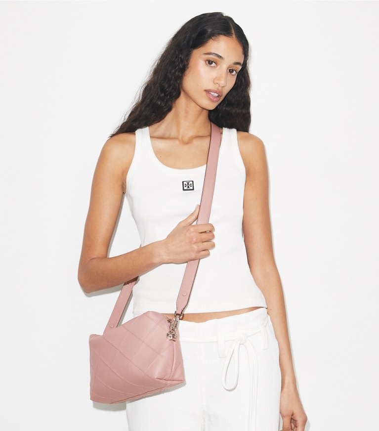 Tory Burch designer crossbody bags Large Fleming Soft Crossbody Bag in Light Mauve accessory on model