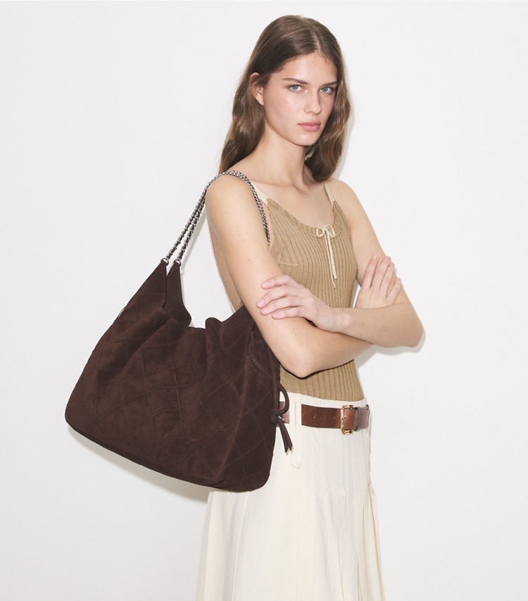 Tory Burch designer tote bags Large Fleming Suede Tote in Dark Cocoa accessory on model