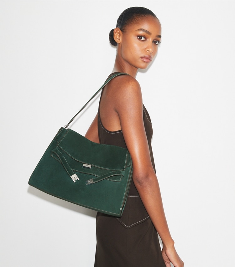 Tory Burch designer shoulder bags Large Lee Radziwill Suede Shoulder Bag in Warm Teal accessory on model