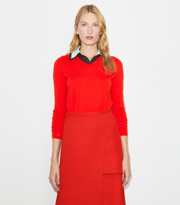 Tory Burch designer sweaters Layered Merino Wool Sweater in Fiery Red/ Frozen Blue on model detail