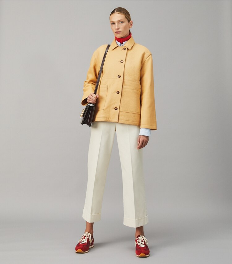 Tory Burch designer jackets Leather Barn Jacket in Peanut Shell on model front