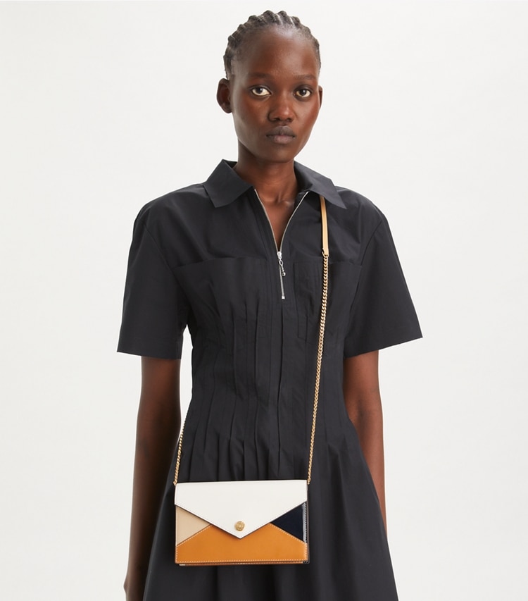 Tory Burch designer mini bags Leather Envelope Crossbody in Blanc Multi accessory on model