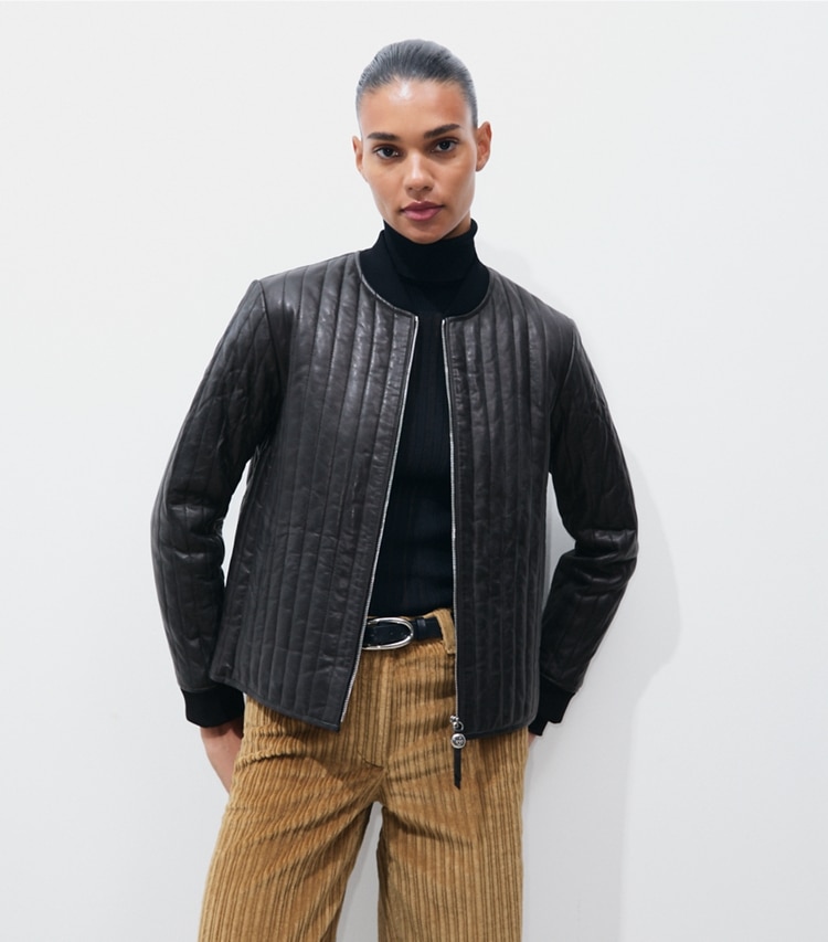 Tory Burch designer jackets Leather Quilted Jacket in Black on model detail