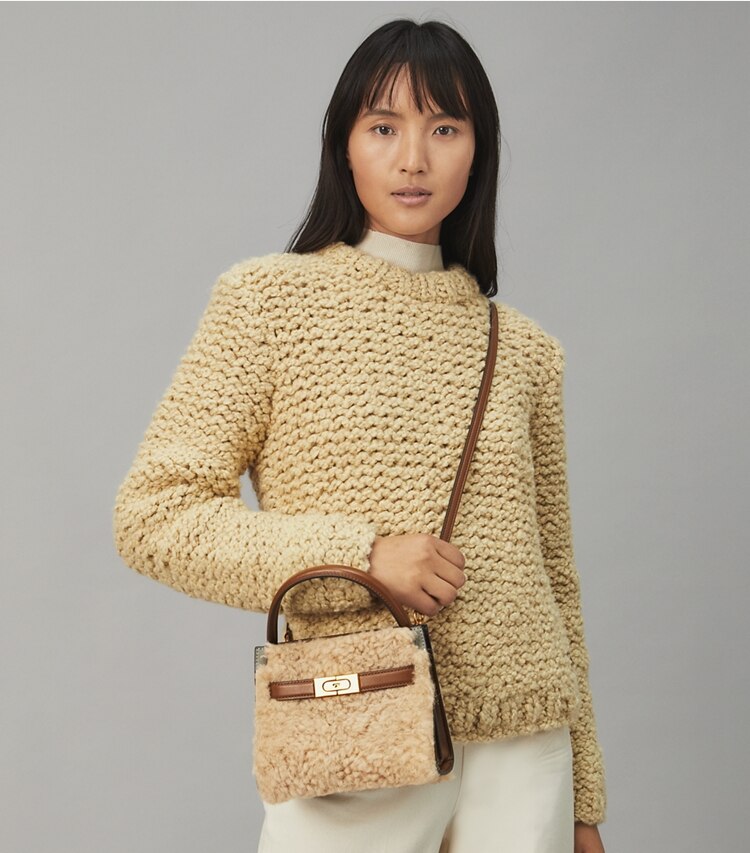 Tory Burch designer crossbody bags Lee Radziwill Petite Double Bag in Natural accessory on model