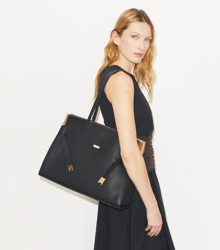 Tory Burch designer tote bags Lee Radziwill Tote in Black accessory on model