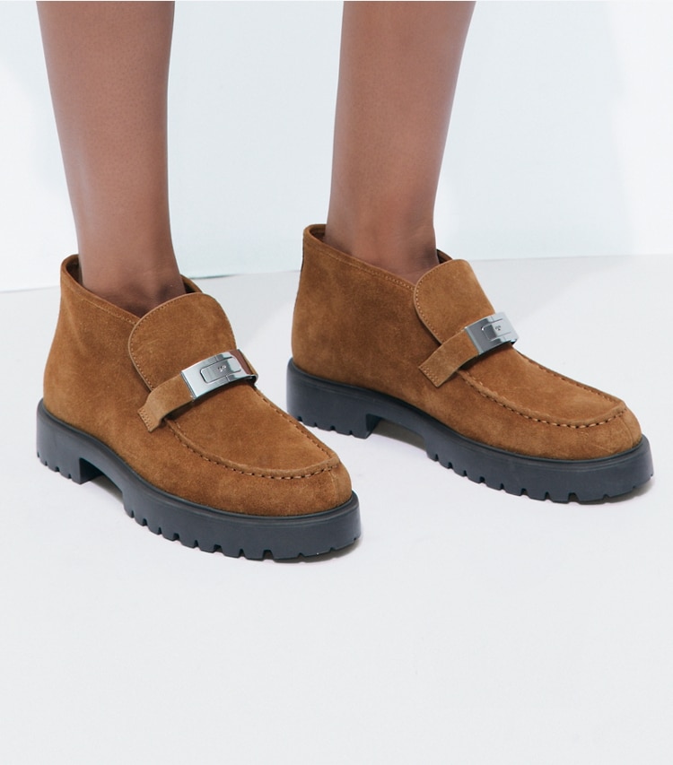 Tory Burch designer ankle boots LeeLee Lug Boot in WEATHERED OAK accessory on model
