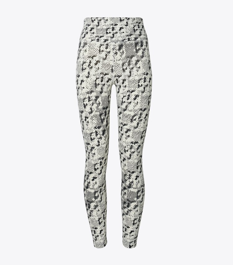 Tory Sport designer bas Legging 7/8 Weightless imprimé à taille haute in New Ivory Distressed Pixelated Logo front