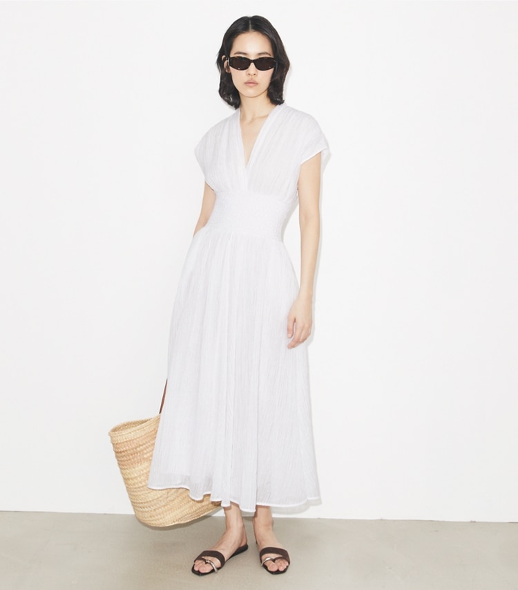 Tory Burch designer strandmode Leinenkleid mit V-Ausschnitt in White modell von vorn