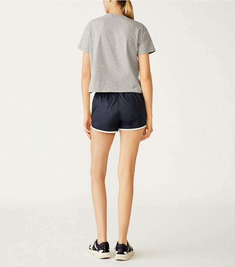 Tory Sport designer bottoms Lightweight Nylon Track Short in Tory Navy on model back