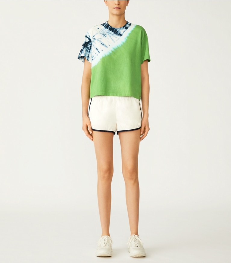 Tory Sport designer bottoms Lightweight Nylon Track Short in Snow White front