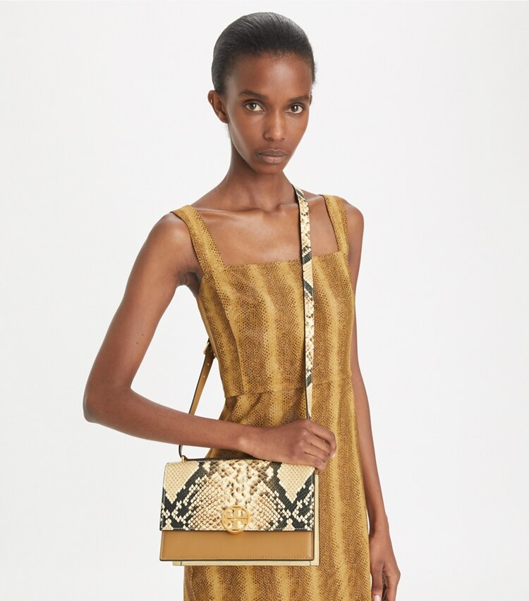 Tory Burch designer schultertaschen Limited-Edition Snake-Embossed Shoulder Bag in Coriander / Black Multi additional on model