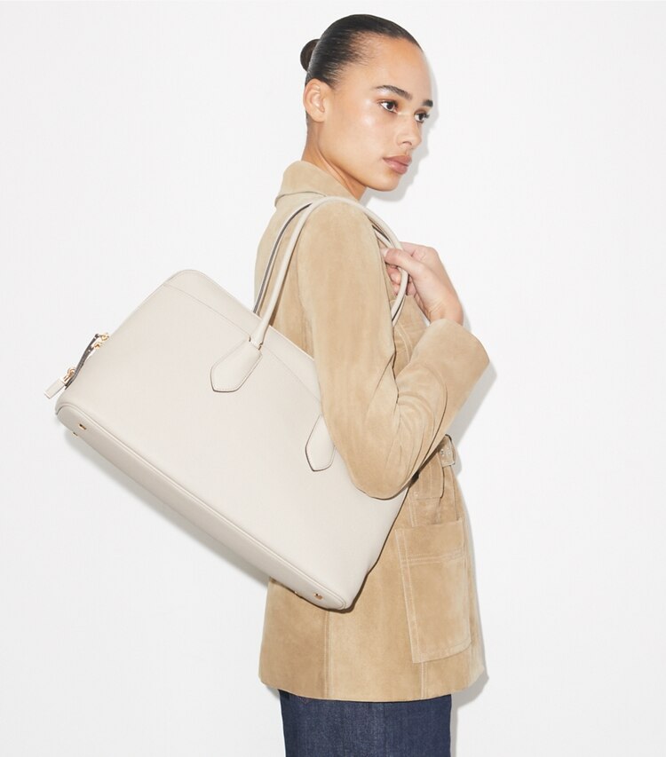 Tory Burch designer satchels Lock Satchel in Light Stone accessory on model