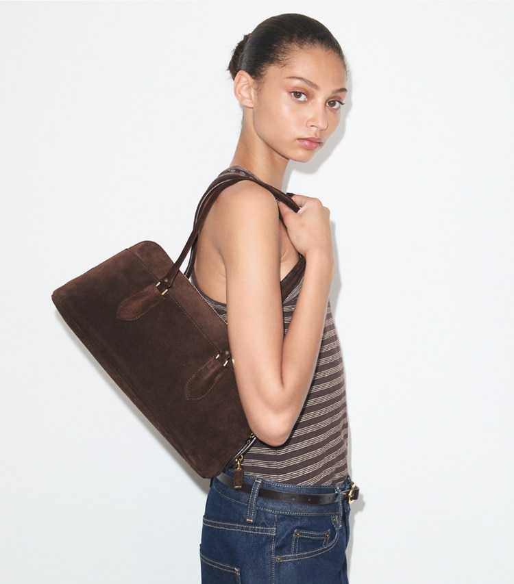 Tory Burch designer satchels Lock Suede East-West Satchel in Dark Cocoa accessory on model