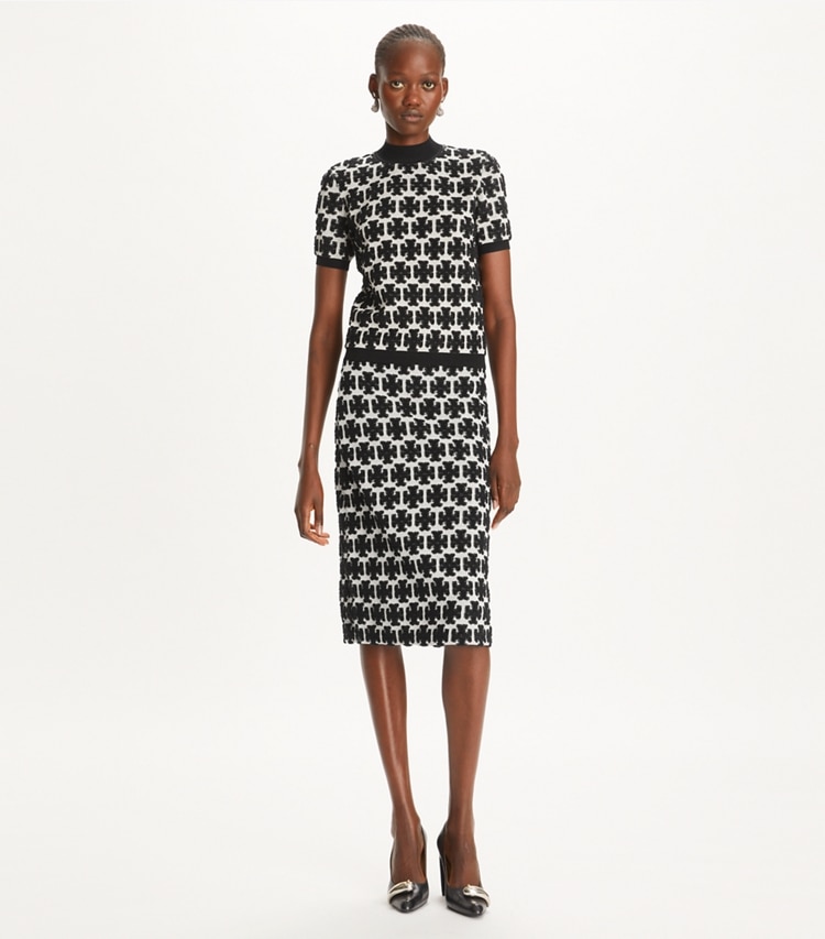 Tory Burch designer bottoms Logo Bouclé Skirt in BLACK / FRENCH CREAM on model front